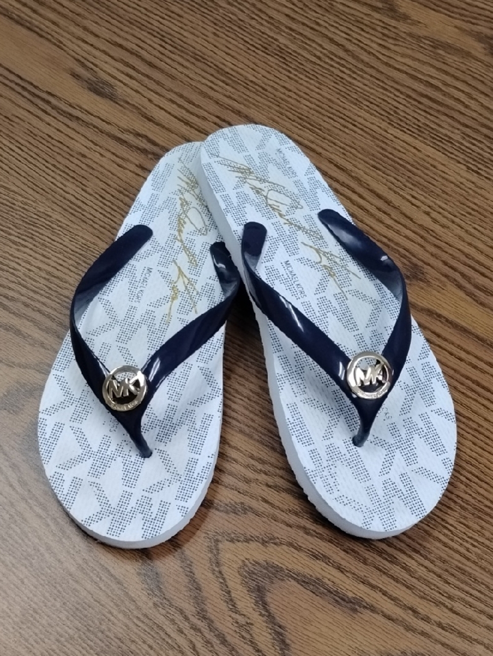 Michael Kors Jet Set Navy Flip Flops with Gold Logo Charm